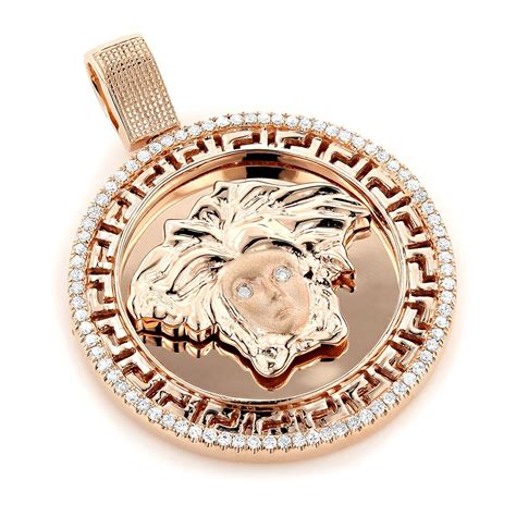 14k gold versace pendant.